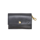 Rückseite des Kotbeutelspender aus Leder in Schwarz – hochwertig, kompakt, mit goldener Hardware