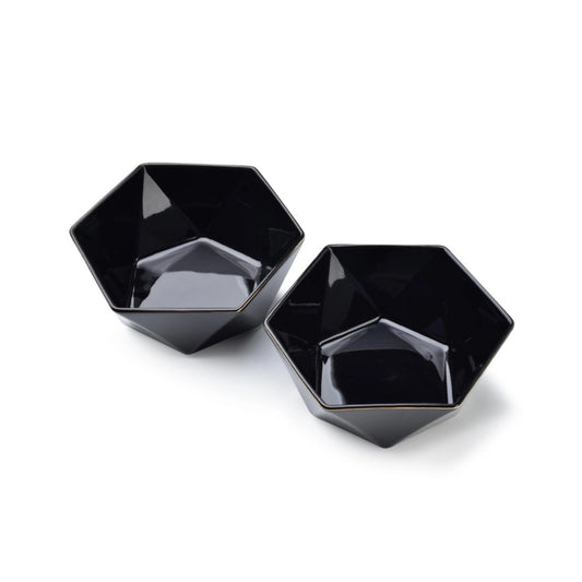 Zwei schwarze, sechseckige Porzellan-Futternäpfe für Hunde und Katzen, modernes Design mit glänzender Oberfläche.